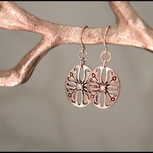 Dangly circular diamond earrings